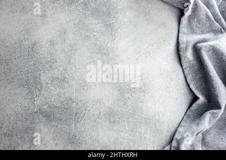 Kitchen table background with gray napkin. Top view. Stock Photo