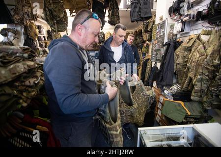 Picture shows Ukrainian men buying army surplus at G4 Echelon Military Supplies ahead of signing up in the UK to fight the Russians in Ukraine. PHOTO: Stock Photo