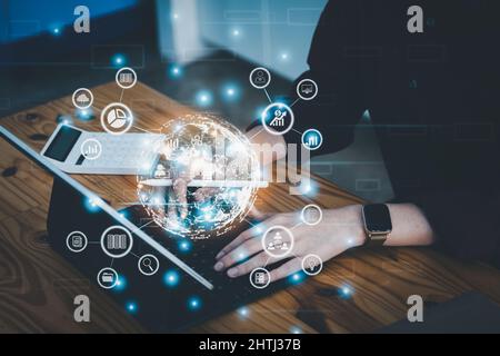 world of data analytics and digital technology, women are using tablet computers to analyze data through internet world, finance, budget, data storage Stock Photo