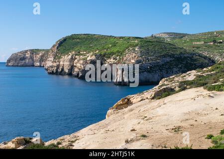 The bay and low cliffs of the drowned ria valley of Mgarr ix-Xini, in the island of Gozo, Malta Stock Photo