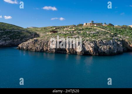 The bay and low cliffs of the drowned ria valley of Mgarr ix-Xini, in the island of Gozo, Malta Stock Photo