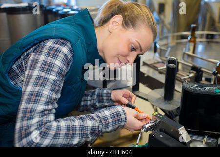 young beautiful milling machining worker Stock Photo