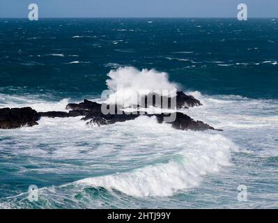 Waves breaking on The Carracks rocks between Zennor and St Ives, Cornwall Stock Photo