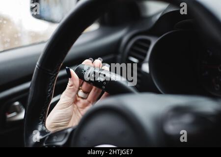 Switch off lights in a car. Car integrated turning indicator Stock Photo