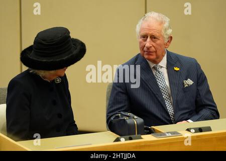 The Prince of Wales and Duchess of Cornwall stand in the council chamber at the Civic Centre in Southend-on-Sea, where he will formally present 'Letters Patent' on behalf of the Queen and make a short speech during the council meeting to mark the conferral of City status on Southend-on-Sea. Picture date: Tuesday March 1, 2022. Stock Photo
