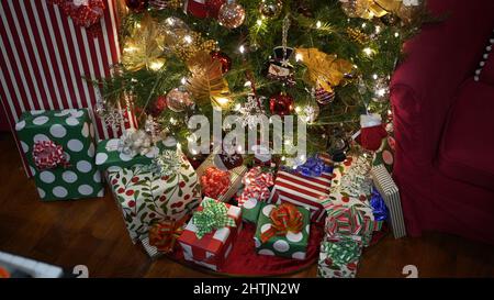 A closeup of the Christmas presents under the Christmas tree. Stock Photo