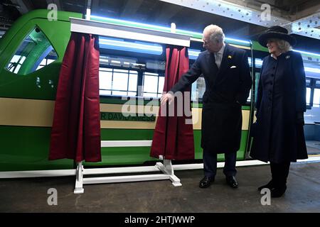 The Prince of Wales and Duchess of Cornwall unveil a new eco-friendly Southend-on-Sea Pier Train named after the late MP for Southend West, Sir David Amess, during a visit to the sea front and to attend a reception for volunteers and community leaders at Sands by the Sea restaurant. Picture date: Tuesday March 1, 2022. Stock Photo