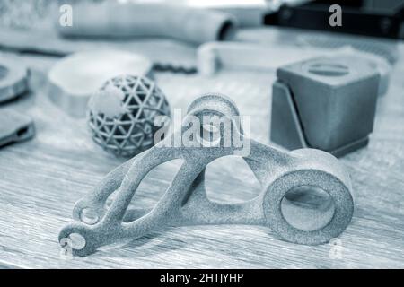 Different Abstract objects printed on powder 3D printer. Multi Jet Fusion MJF. Stock Photo