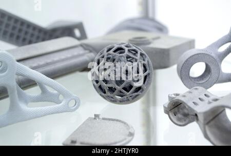 Gray abstract models printed on 3d printer from powder close-up. Stock Photo