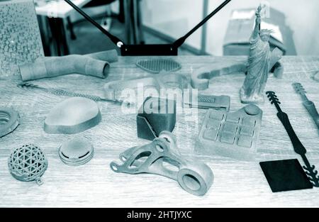 Different gray models printed on 3d printer from powder close-up. Stock Photo