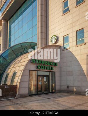 Ulsan, South Korea - Starbucks coffee store located at the Hyundai Department Store. The largest coffeehouse company in the world. Stock Photo