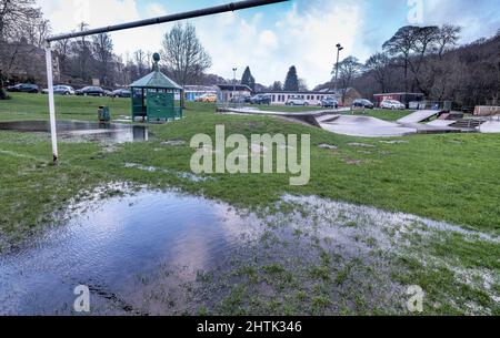 Waterlogged skatepark and recreational grounds, no children due to weather. School holidays letdown, Stock Photo