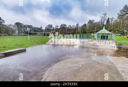 Waterlogged skatepark and recreational grounds, no children due to weather. Stock Photo
