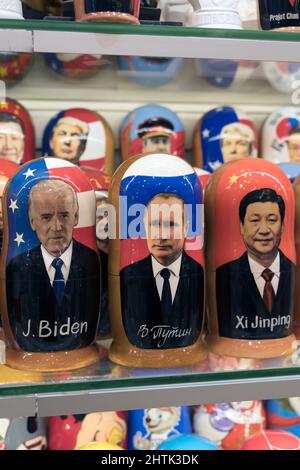 Moscow, Russia - February 28, 2022: Putin, Biden and Xi Jinping in the form of Russian nesting dolls in a gift shop in Moscow. Relations between Russia, USA and China. High quality photo Stock Photo