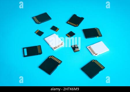 SD and MicroSD memory cards on a blue background. Stock Photo
