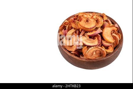 Wooden bowl full of dried apple slices,white background Stock Photo