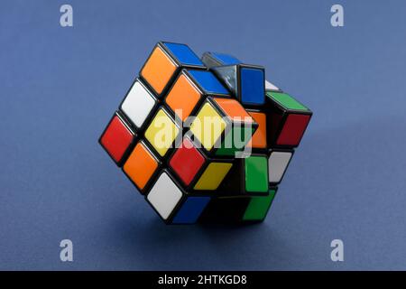 ISTANBUL - TURKEY - JANUARY 30 2022: Rubik's cube on the blue background. Rubik's Cube invented by a Hungarian architect Erno Rubik in 1974. Stock Photo