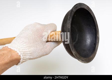 hand holding vantus with wooden handle on white background. High quality photo Stock Photo