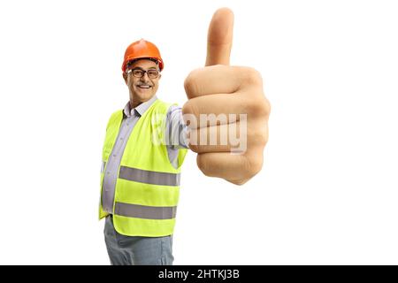 Cheerful mature male engineer showing thumbs up isolated on white background Stock Photo