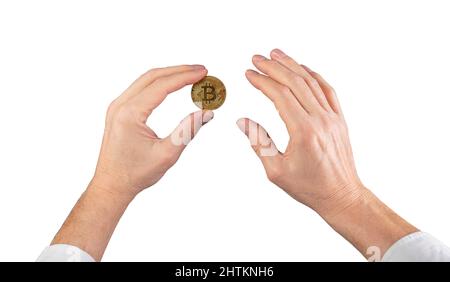 Businessman hand holding bitcoin coin isolated on white background. Cryptocurrency market and virtual money concept. High quality photo Stock Photo