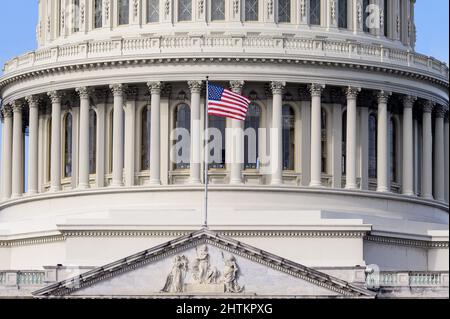 Washington, United States. 01st Mar, 2022. American flag flying over the Capitol, Washington. Credit: SOPA Images Limited/Alamy Live News Stock Photo