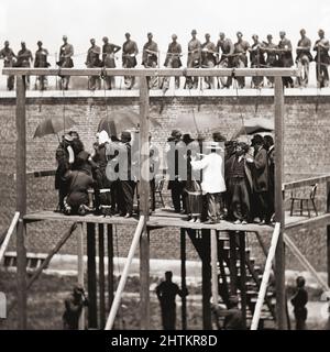 Mary Surratt, Lewis Powell, David Herold, and George Atzerodt moments before their execution on the gallows at Fort McNair, Washington D.C., July 7, 1865.  They had been convicted of being part of the conspiracy which resulted in the assassination of President Abraham Lincoln by John Wilkes Booth  on April 14, 1865. Stock Photo