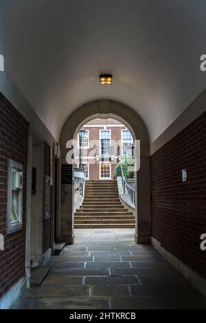 Atmospheric view through an arch in the Temple district, one of the main Law areas of the capital, London, UK Stock Photo