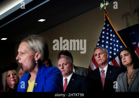 Washington, DC, US, March 1, 2022, United States Representative Debbie Lesko (Republican of Arizona), left, United States House Minority Whip Steve Scalise (Republican of Louisiana), third from left, United States House Minority Leader Kevin McCarthy (Republican of California), second from right, and United States Representative Nicole Malliotakis (Republican of New York), right, listen as United States Representative Victoria Spartz (Republican of Indiana), second from left, offers remarks on the current situation in Ukraine and United States President Joe Biden's upcoming State of the Union  Stock Photo