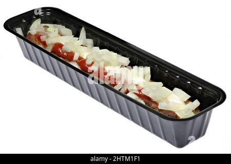 Dutch frikandel speciaal in a black plastic container isolated on white background Stock Photo