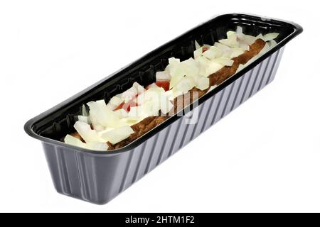 Dutch frikandel speciaal in a black plastic container isolated on white background Stock Photo