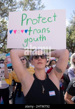 Austin, United States. 01st Mar, 2022. Texas transgender youth, their loved ones and families rally at the State Capitol in Austin decrying Governor Greg Abbott's directive to state health agencies to investigate gender-affirming care to transgender youth as child abuse. This comes after the state legislature restricted transgender schoolchildren in sports activities. Many licensed health care providers have pushed back on the governor's directive. Credit: Bob Daemmrich/Alamy Live News Stock Photo