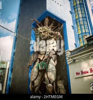 The Green man sculpture standing tall at the Custard Factory, Digbeth. A lively arts and entertainment area within Birmingham. Stock Photo