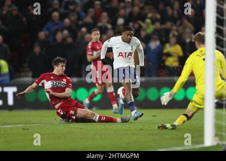 MIDDLESBROUGH, UK. MAR 1ST Middlesbrough's Paddy McNair blocks Steven Bergwijn shot on goal during the FA Cup Fifth Round match between Middlesbrough and Tottenham Hotspur at the Riverside Stadium, Middlesbrough on Tuesday 1st March 2022. (Credit: Mark Fletcher | MI News) Credit: MI News & Sport /Alamy Live News Stock Photo