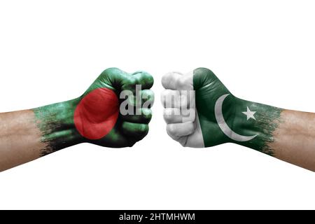 Two hands punch to each others on white background. Country flags painted fists, conflict crisis concept between bangladesh and pakistan Stock Photo