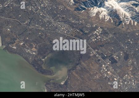 International Space Station, EARTH ORBIT. 13 February, 2022. The city of Provo, Utah, on Utah Lake and Provo Bay, is pictured from the International Space Station as it orbited 260 miles above the northwest United States, February 13, 2022 from Earth Orbit. Stock Photo