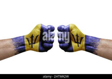 Two hands punch to each others on white background. Country flags painted fists, conflict crisis concept between barbados and barbados Stock Photo
