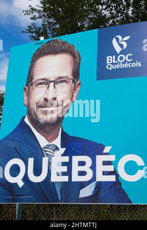 Illustration of Bloc Quebecois leader Yves-François Blanchet on Canadian 2021 Federal election poster in Old Terrebonne, Quebec, Canada. Stock Photo