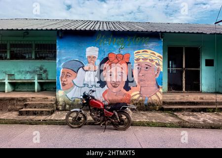 Colorful mural in the Garifuna community of Livingston, Guatemala Stock Photo