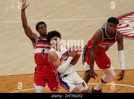 Washington, USA. 01st Mar, 2022. WASHINGTON, DC - MARCH 01: Detroit Pistons guard Killian Hayes (7) pushes by Washington Wizards guard Ish Smith (4) during a NBA game between the Washington Wizards and the Detroit Pistons, on March 01, 2022, at Capital One Arena, in Washington, DC. (Photo by Tony Quinn/SipaUSA) Credit: Sipa USA/Alamy Live News Stock Photo