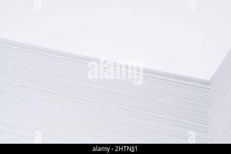 Close up of a stack of paper background. A4 blank paper stack texture. Mockup. Stack of blank paper sheets pattern. Macro Stock Photo