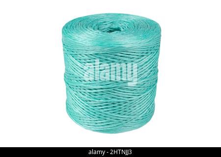 Coiled nylon rope isolated on white background. Blue rolled  striped nylon rope isolated. A coil of new colored rope. Stock Photo