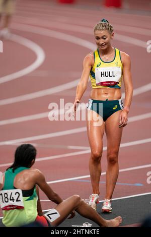 Jessica Hull hugging a friend at the finish line in the 1500 meters at