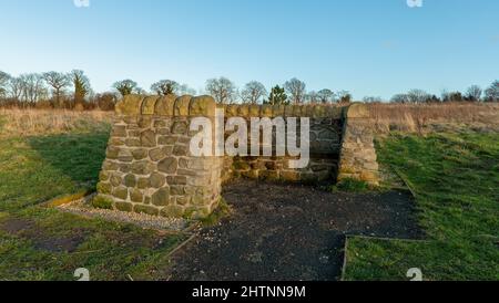 Stone Seat in Little France Park, Edinburgh, Scotland, UK Stock Photo