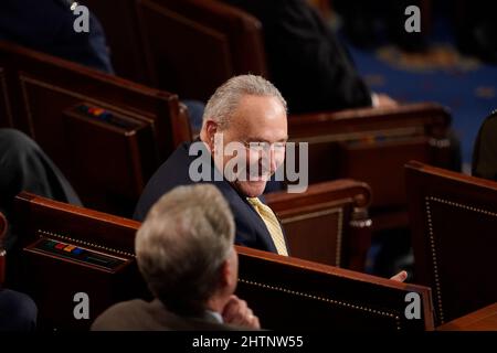 Washington, DC, USA. 1st Mar, 2022. Senate Majority Leader Chuck Schumer, a Democrat from New York, smiles while attending the State of the Union address by U.S. President Joe Biden at the U.S. Capitol in Washington, DC, U.S., on Tuesday, March 1, 2022. Biden's first State of the Union address comes against the backdrop of Russia's invasion of Ukraine and the subsequent sanctions placed on Russia by the U.S. and its allies. Credit: Al Drago/Pool via CNP/dpa/Alamy Live News Stock Photo