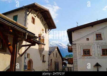 Quaint narrow streets of Muestair, Region Engiadina Bassa / Val Muestair in Swiss canton Graubuenden Stock Photo