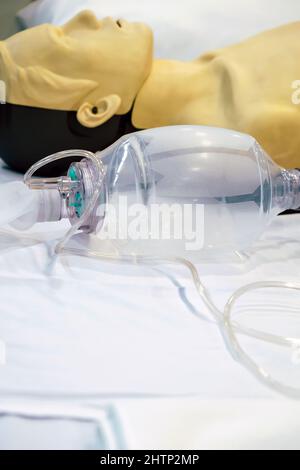 Image of CPR dummy with defibrillator Stock Photo