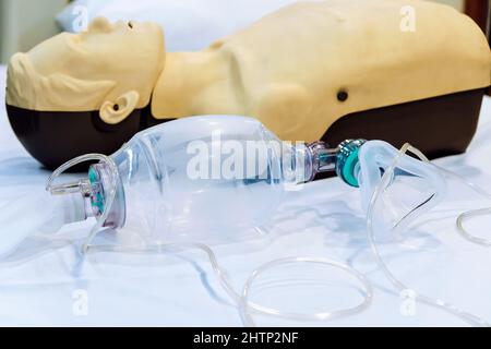 Image of CPR dummy with defibrillator Stock Photo