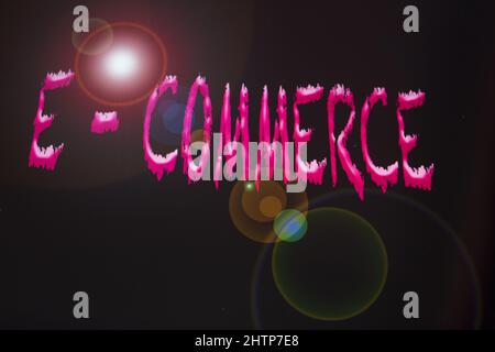 concept of e-commerce with  the phrase on the black backgorund Stock Photo