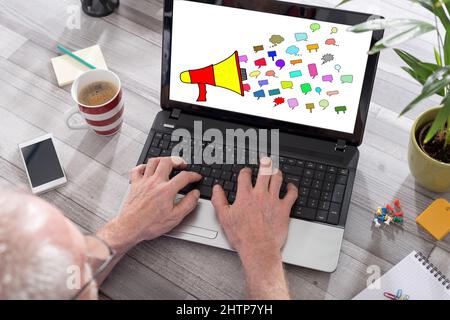Communication concept shown on a laptop used by a man Stock Photo