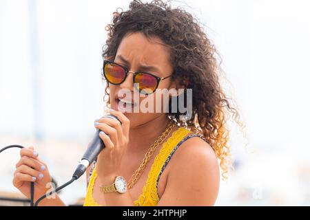 One female person woman singer in Marina Las Morlas, Varadero, Cuba Stock Photo